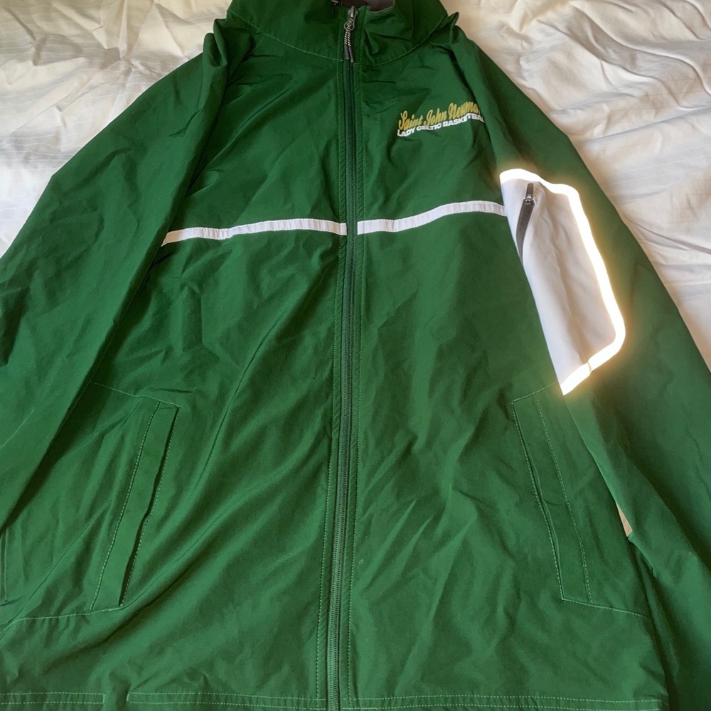 A green lady Celtics windbreaker